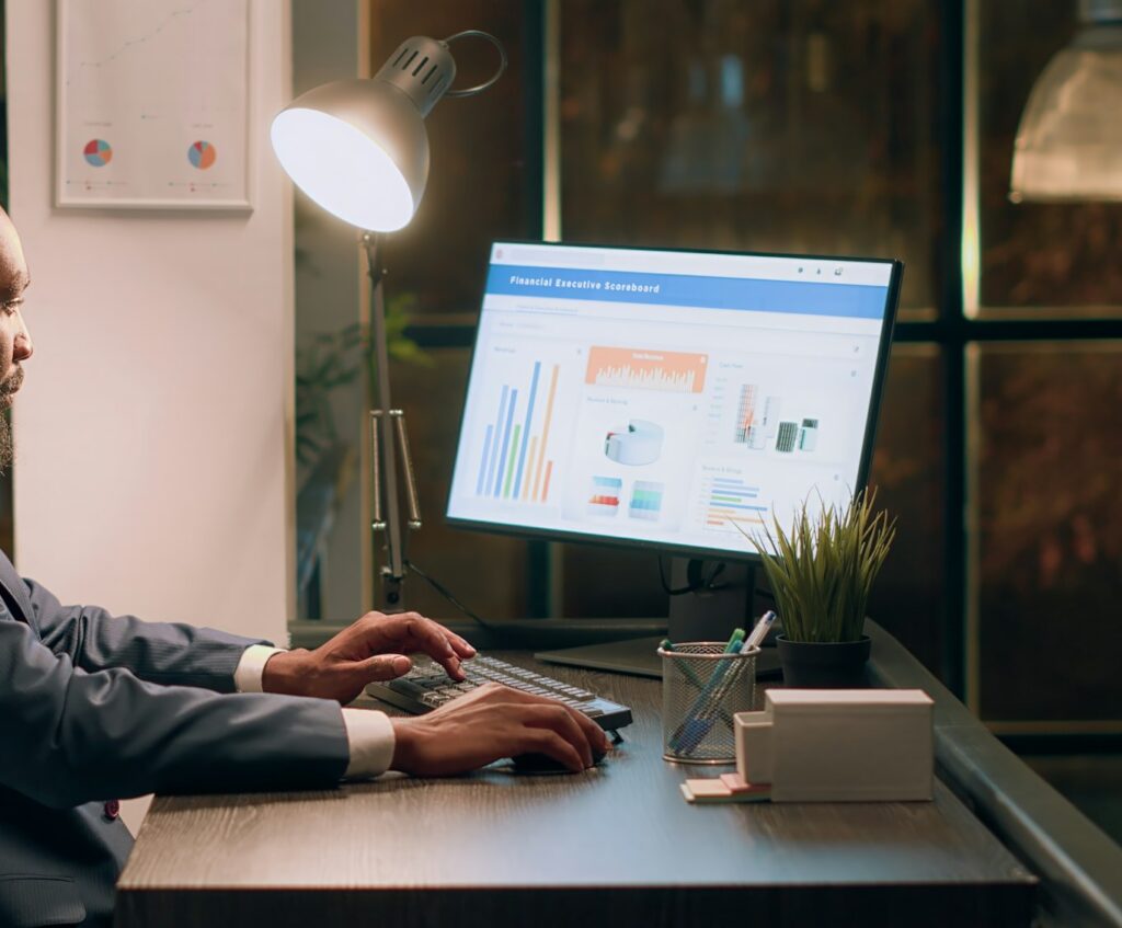 Employee working on payroll reports